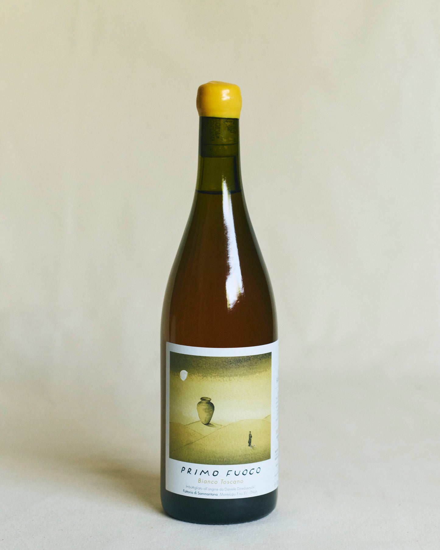 Primo Fuoco Bianco Toscano 2024 – bottle of natural orange wine from Tuscany with pink label design.